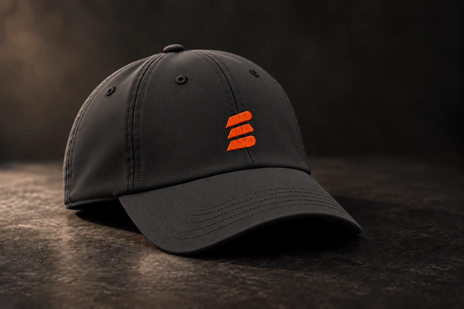 Charcoal Buildside baseball cap with an orange stacks mark and curved brim
