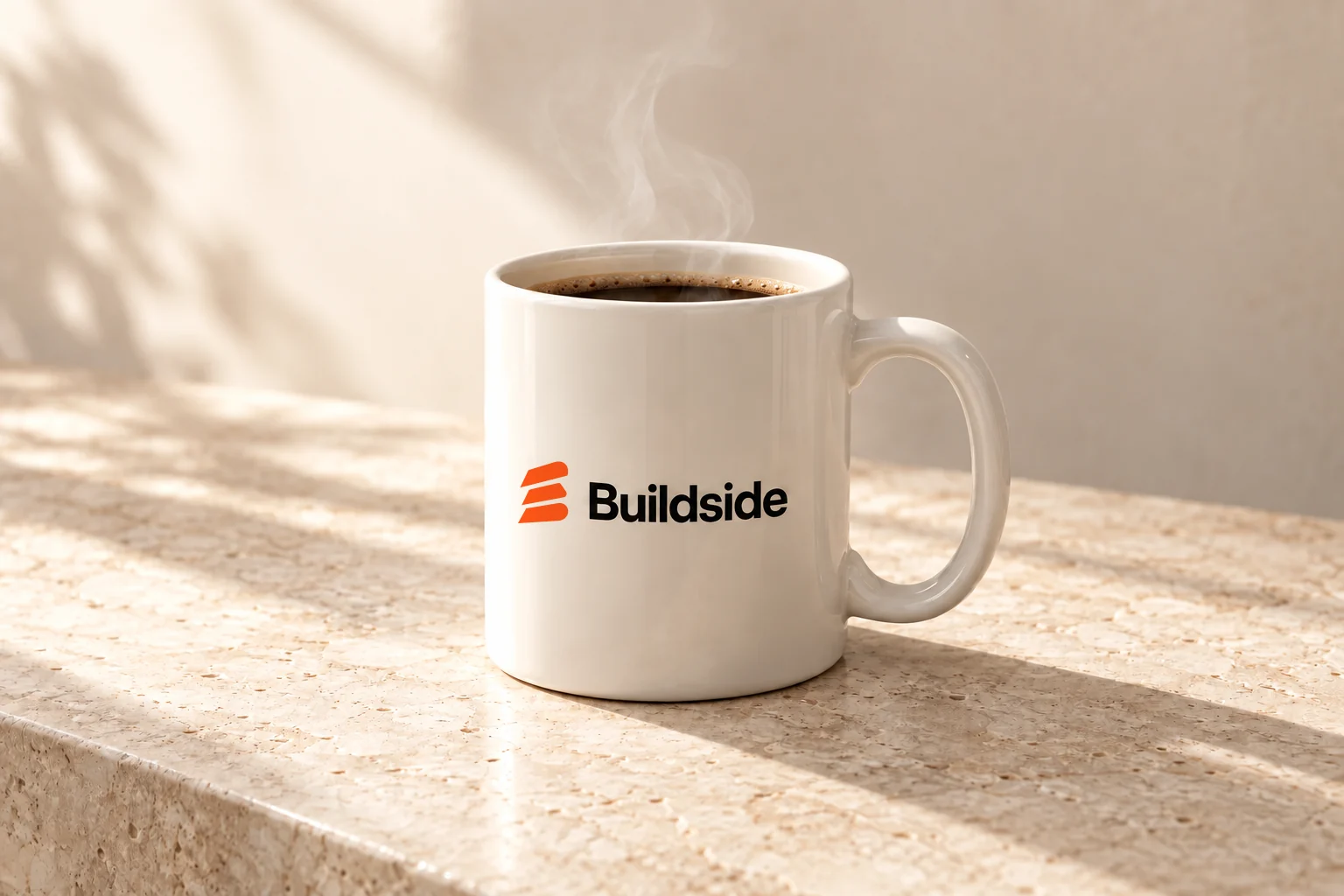 Warm-white Buildside coffee mug with an orange and black logo